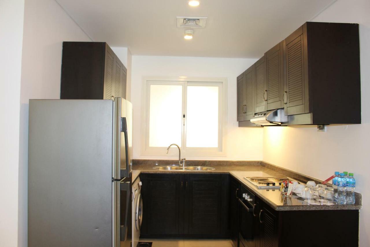 Moevenpick Hotel & Resort Al Bida'A Salmiya Экстерьер фото A typical kitchen in a residential apartment
